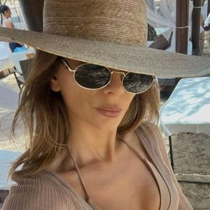 Prada PR65ZS ZVN09T Pale Gold Dark Grey Oval Metal Unisex Sunglasses